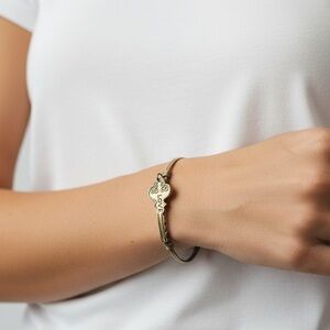 Gold Tone “Love” Key Bracelet